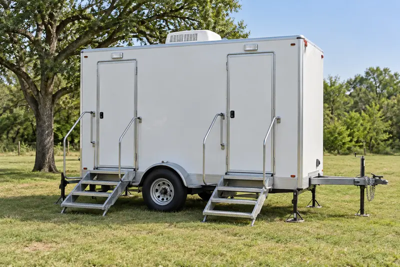 Portable restroom trailer with entrance steps